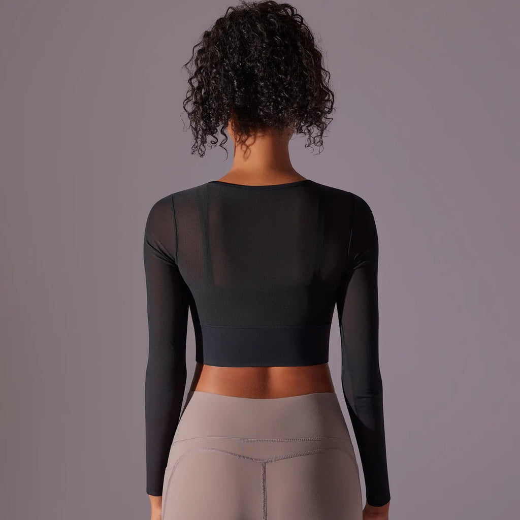Haut de yoga et fitness manches longues en maille respirante bicolore ajustée pour femme