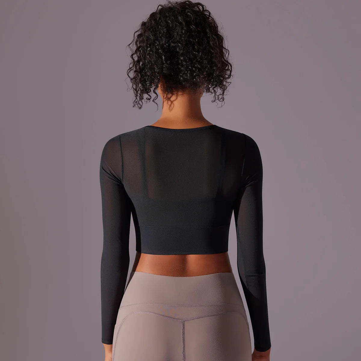 Haut de yoga et fitness manches longues en maille respirante bicolore ajustée pour femme
