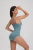 Body gainant sans coutures à armatures, coupe string, contrôle du ventre