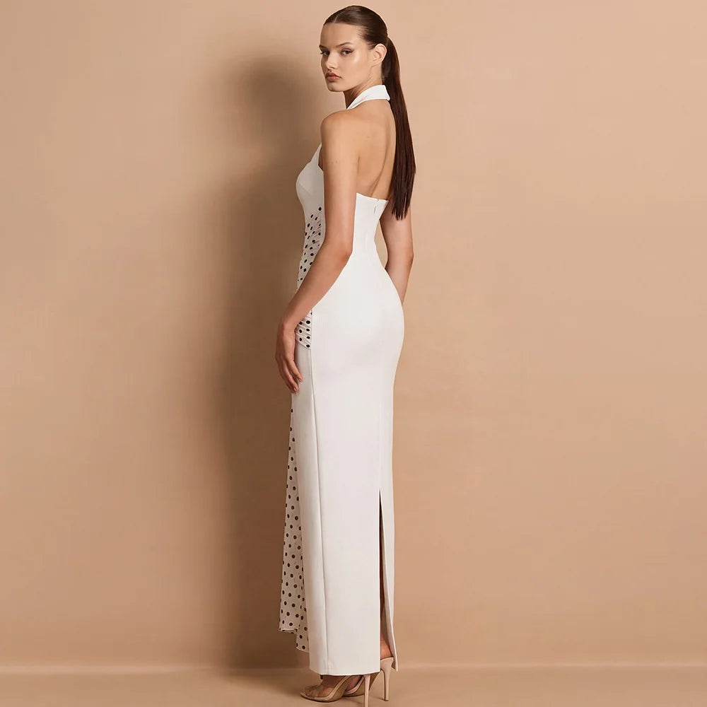 Robe longue d’été dos nu à col licou, fente arrière et coupe ajustée