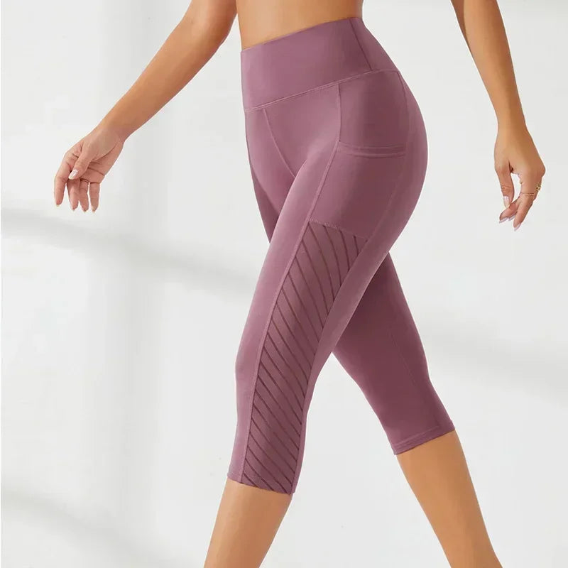High-waisted sports shorts, shaping effect, for running, yoga, with side pockets.