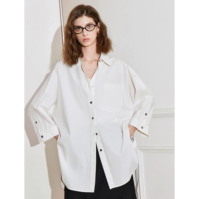 Women's mid-length shirt with 3/4 sleeves – pockets