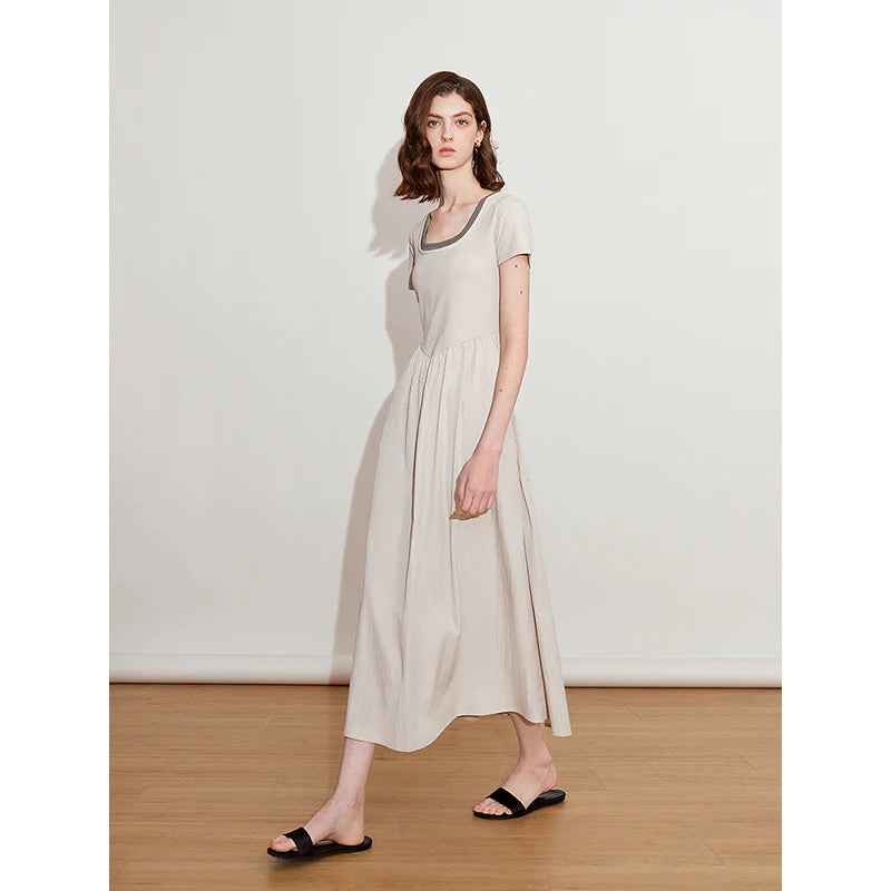 Women's slim-waisted dress with visible short sleeves