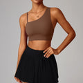 Brassière de sport asymétrique à une épaule avec coussinets