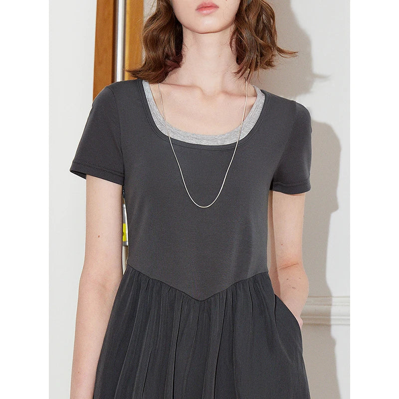 Women's slim-waisted dress with visible short sleeves