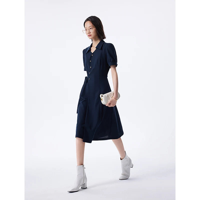 Women's dress with lace-up belt, shirt collar, and puff sleeves, navy blue