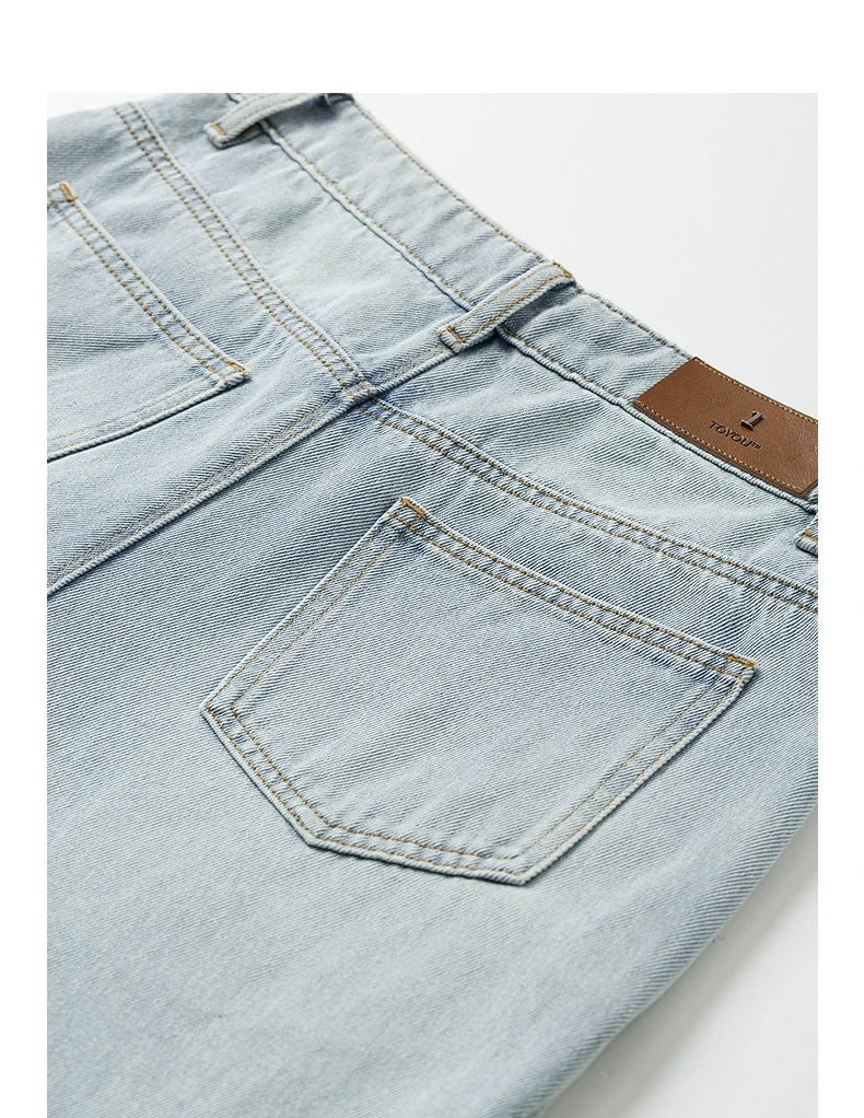 Jean femme taille mi-haute coupe droite large délavé