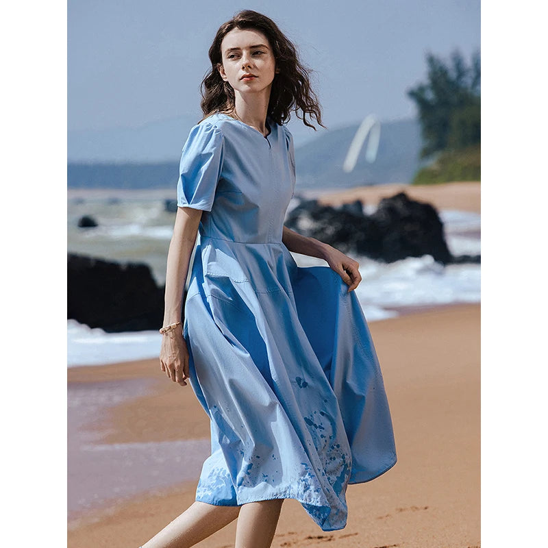 Women's mid-calf summer A-line dress with puff sleeves, V-neck, and pockets