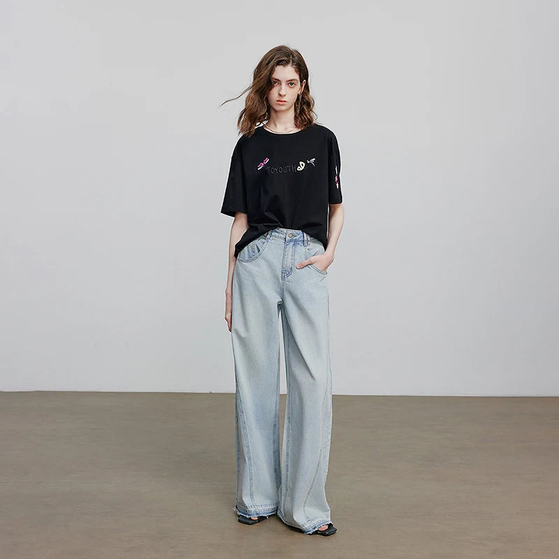 Jean femme taille mi‑haute coupe droite longue