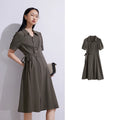 Women's dress with lace-up belt, shirt collar, and puff sleeves, navy blue