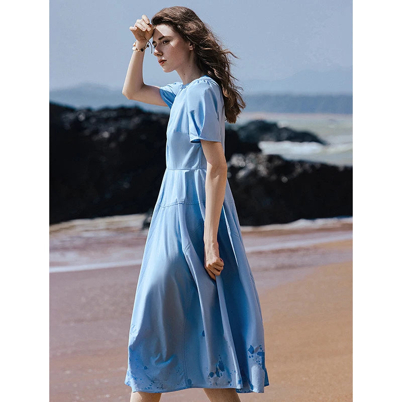 Women's mid-calf summer A-line dress with puff sleeves, V-neck, and pockets