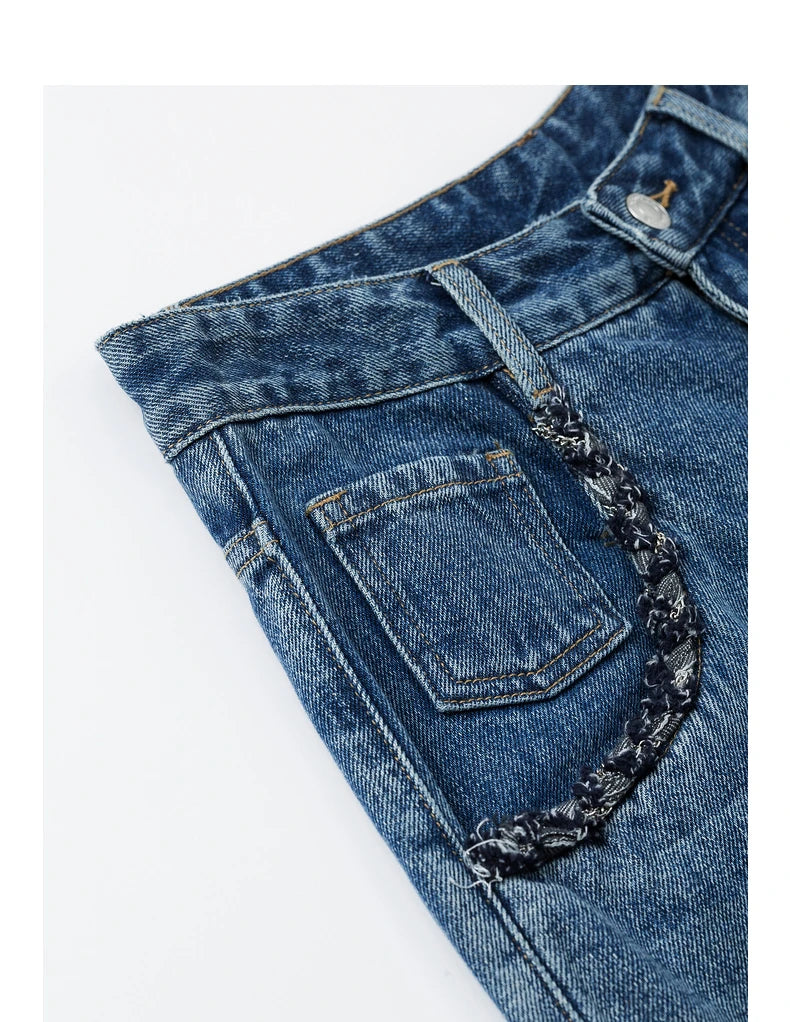 Jean femme taille haute coupe large motif tissé