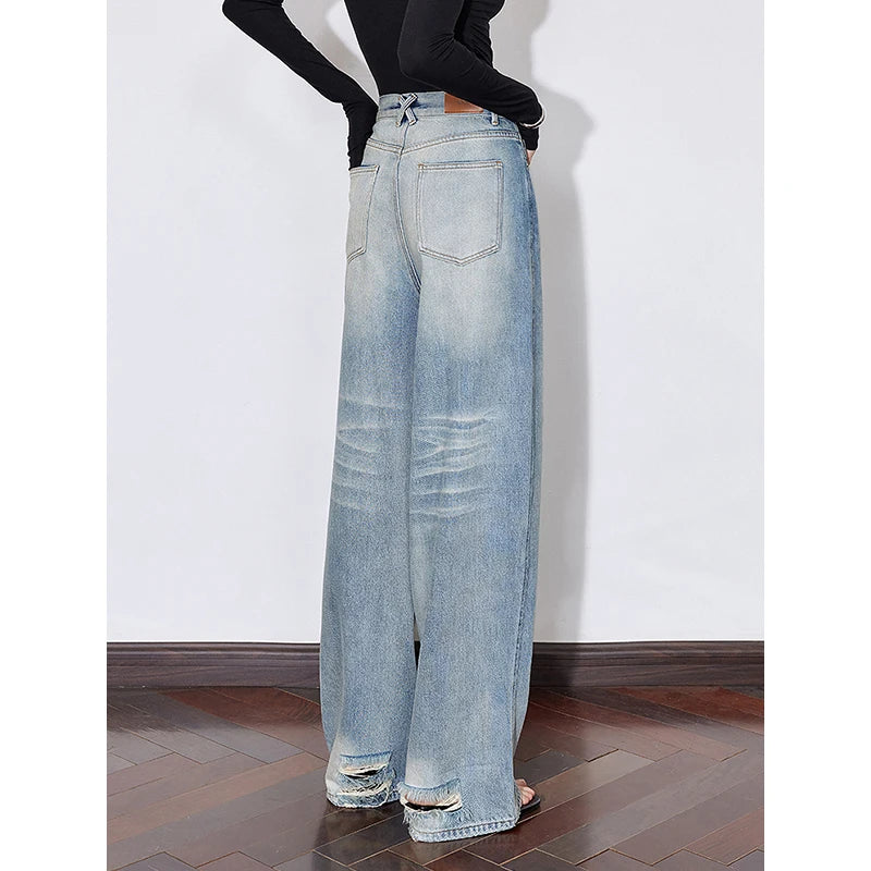 Jean femme taille mi‑haute coupe droite large longueur longue