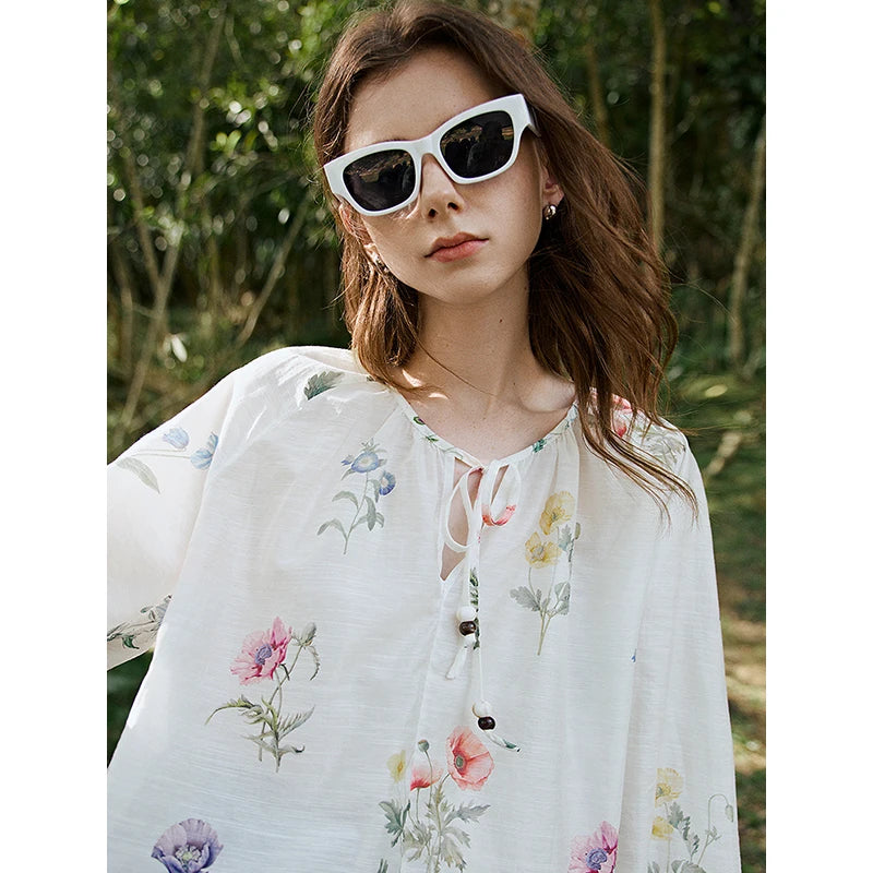 Chemise femme manches longues col rond imprimée style office