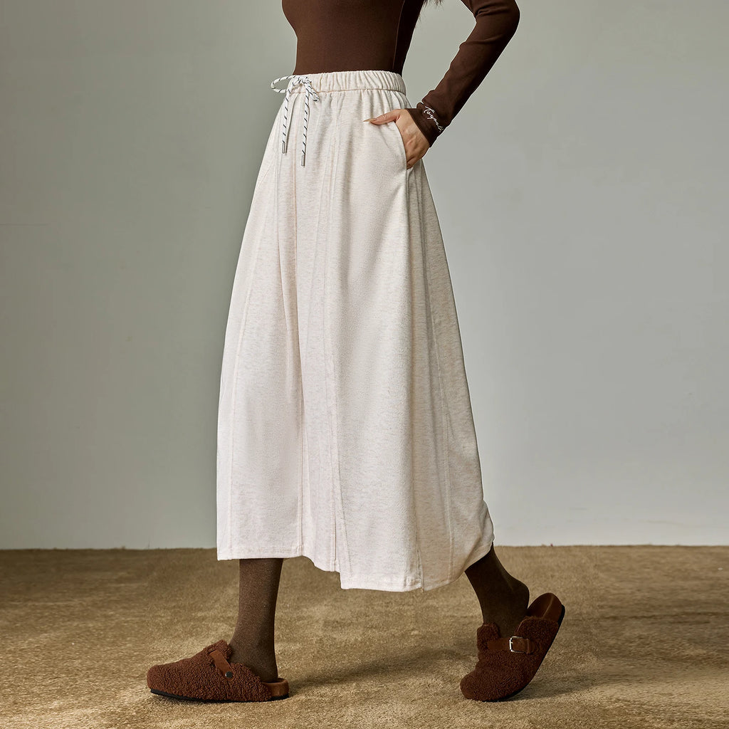 Jupe Midi Femme – Style Cocoon, Taille Élastique, Coupe A-line avec Fente Latérale