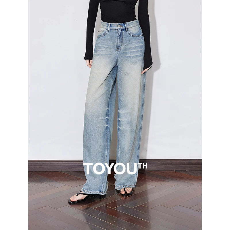 Jean femme taille mi‑haute coupe droite large longueur longue