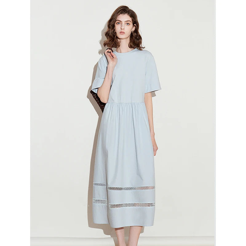 Elegant women's spring dress with a chic and feminine flowing cut