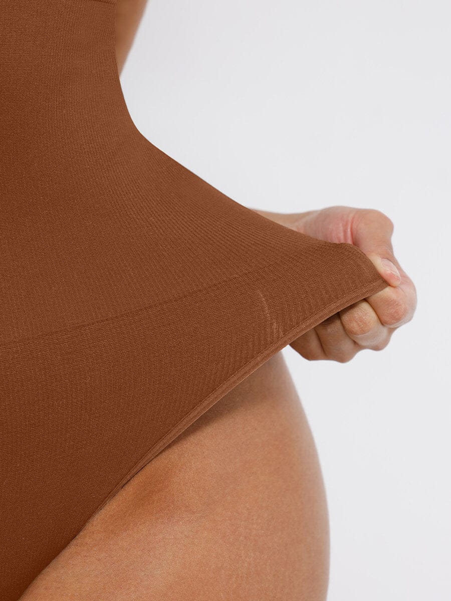 Wholesale Seamless Deep V Waist and Abdomen Shaping Thong Bodysuit